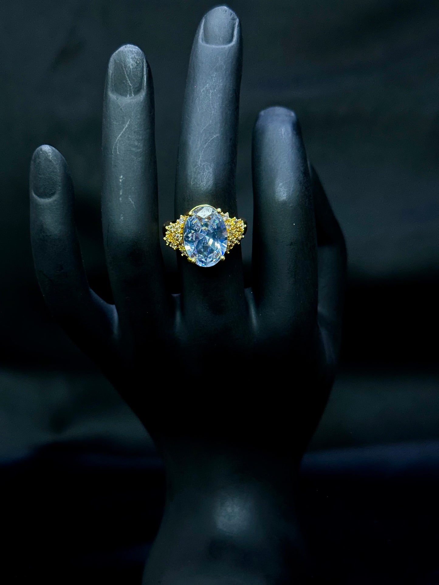 Blue Sapphire Oval Three-Stone Engagement Ring