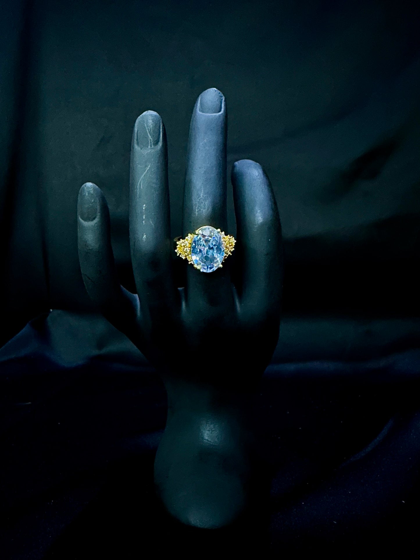 Blue Sapphire Oval Three-Stone Engagement Ring