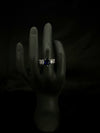 Dark Blue Sapphire Three-Stone Engagement Ring