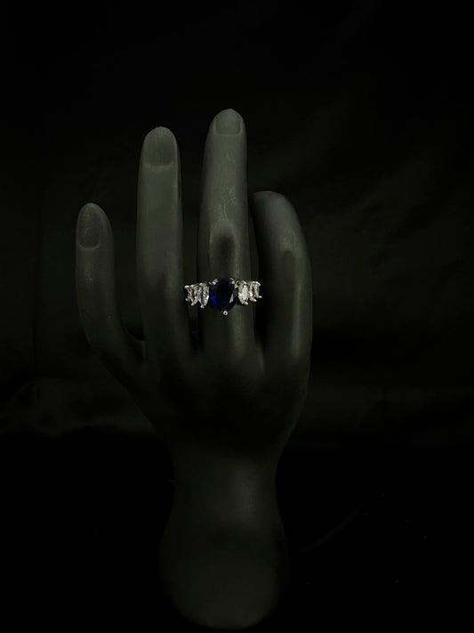 Dark Blue Sapphire Three-Stone Engagement Ring
