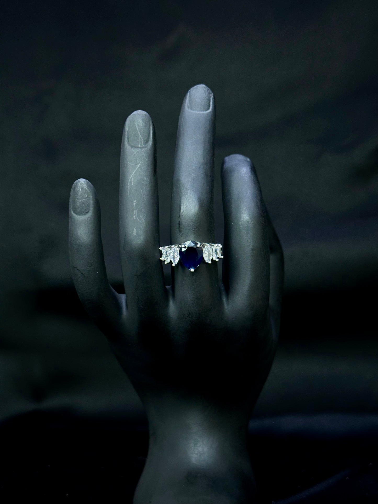 Dark Blue Sapphire Three-Stone Engagement Ring